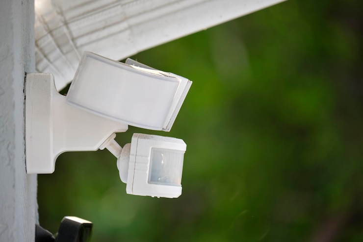 Premium Photo | Motion sensor with light detector mounted on exterior ... Premium Photo | Motion sensor with light detector mounted on exterior ...